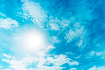 Fototapeta na wymiar Blue sky with clouds and sun