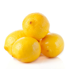 ripe lemons on a white background