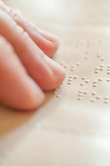 Blind reading text in braille language
