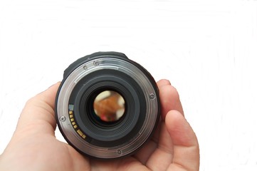 Hand hold lens. View through glass.