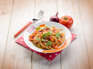 spaghetti with fresh tomato red onion and hot chili pepper