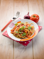 spaghetti with fresh tomato red onion and hot chili pepper