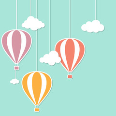 Naklejka premium Hot air baloons and clouds in paper cutout style