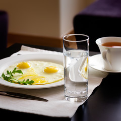 Breakfast with fried eggs