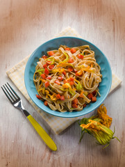 tagliatelle with zucchinis flowers and capsicum