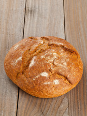 Loaf of bread on wood