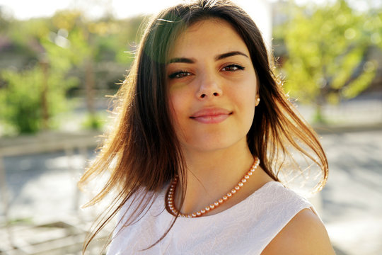 Portrait of a attractive happy woman outdoors