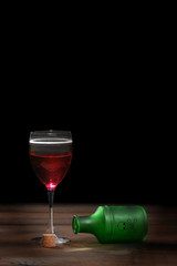 poisoned glass of red wine