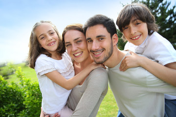 Portrait of happy family of four