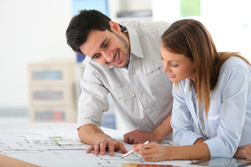 Fototapeta premium Team of architects working together on project