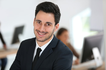 Portrait of young businessman in office