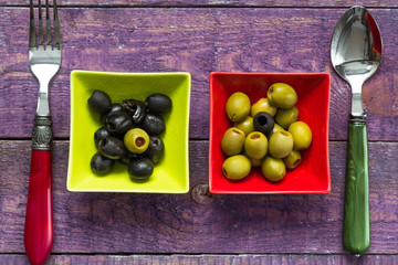 Colorful fruits olives bowls wooden table