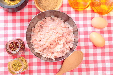 Minced fish in the bowl and spices
