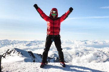 Climber on the top of Mont Blanc