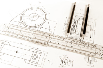 Drawing of the bearing housing with slide rule and pencils