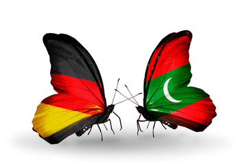 Two butterflies with flags Germany and Maldives