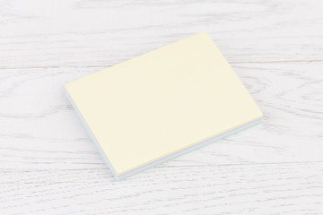 Pack of stickers note on wooden background