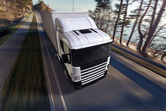 Truck on the road. 3D render on photographic background.