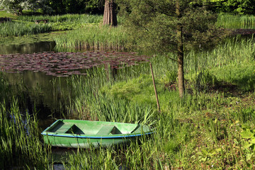 scenic landscape- pond with boat