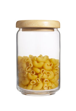 yellow macaroni in bottle on white background
