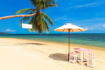 Fototapeta na wymiar Umbrella on tropical beach