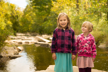 Young Girls - Holding Hands by River