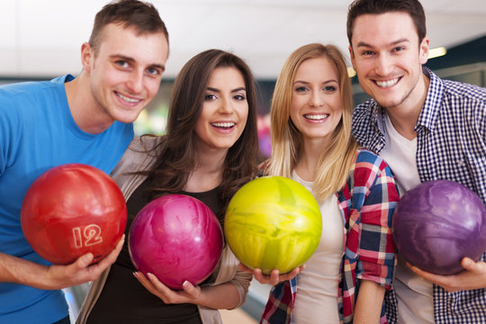 Portrait of group of people at the bowling alley