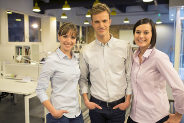 Portrait of 3 coworkers in Startup