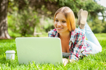 Surfing the net outdoors.