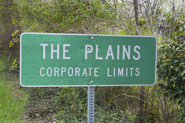 Green road sign for The Plains, Virginia