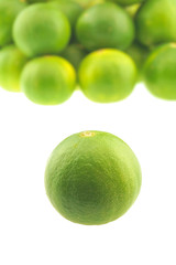 Close up fresh green lemon place isolated