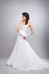 Fototapeta premium Young and beautiful bride over the vintage background