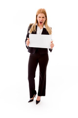 Fototapeta premium Frustrated businesswoman holding a blank placard