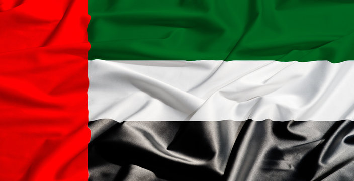 Emirates flag on a silk drape waving