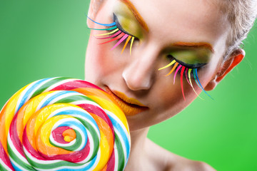 Naklejka premium Colorful twisted lollipop, colorful fashion makeup