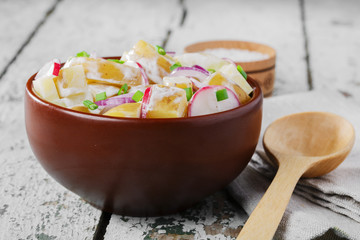 Potato salad with radishes and onions