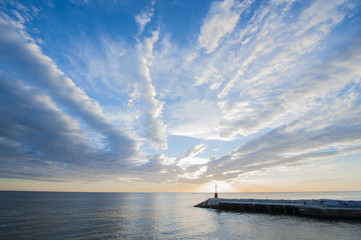 Clouds, sun and sea