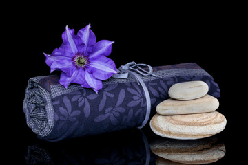Spa still life-towel isolated on black background