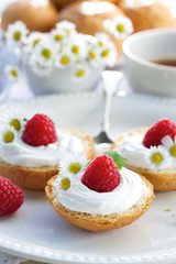 Butter buns with  creamy cheese and fresh raspberries