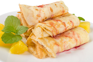pancakes with cherry jam on a white background