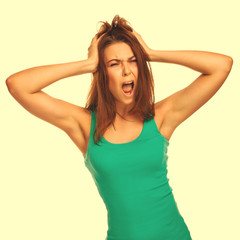 brunette woman yelling opened mouth her emotion studio in jeans