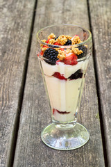 Mixed berry yogurt parfait with strawberries and blackberries