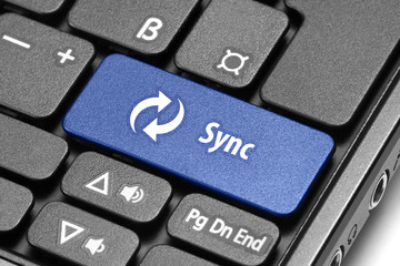 Synchronization. Blue hot key on computer keyboard.
