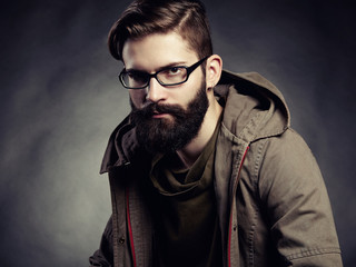 Portrait of man with glasses and beard