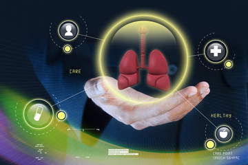 Smart hand showing human lungs