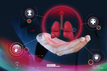Smart hand showing human lungs