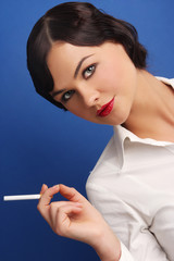 Obraz premium Portrait of an tractive elegant young woman.