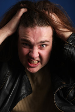 Man with long hair very anxsious