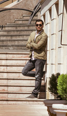 Obraz premium Young guy standing or posing, outdoor shot