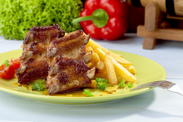 Grilled ribs on plate